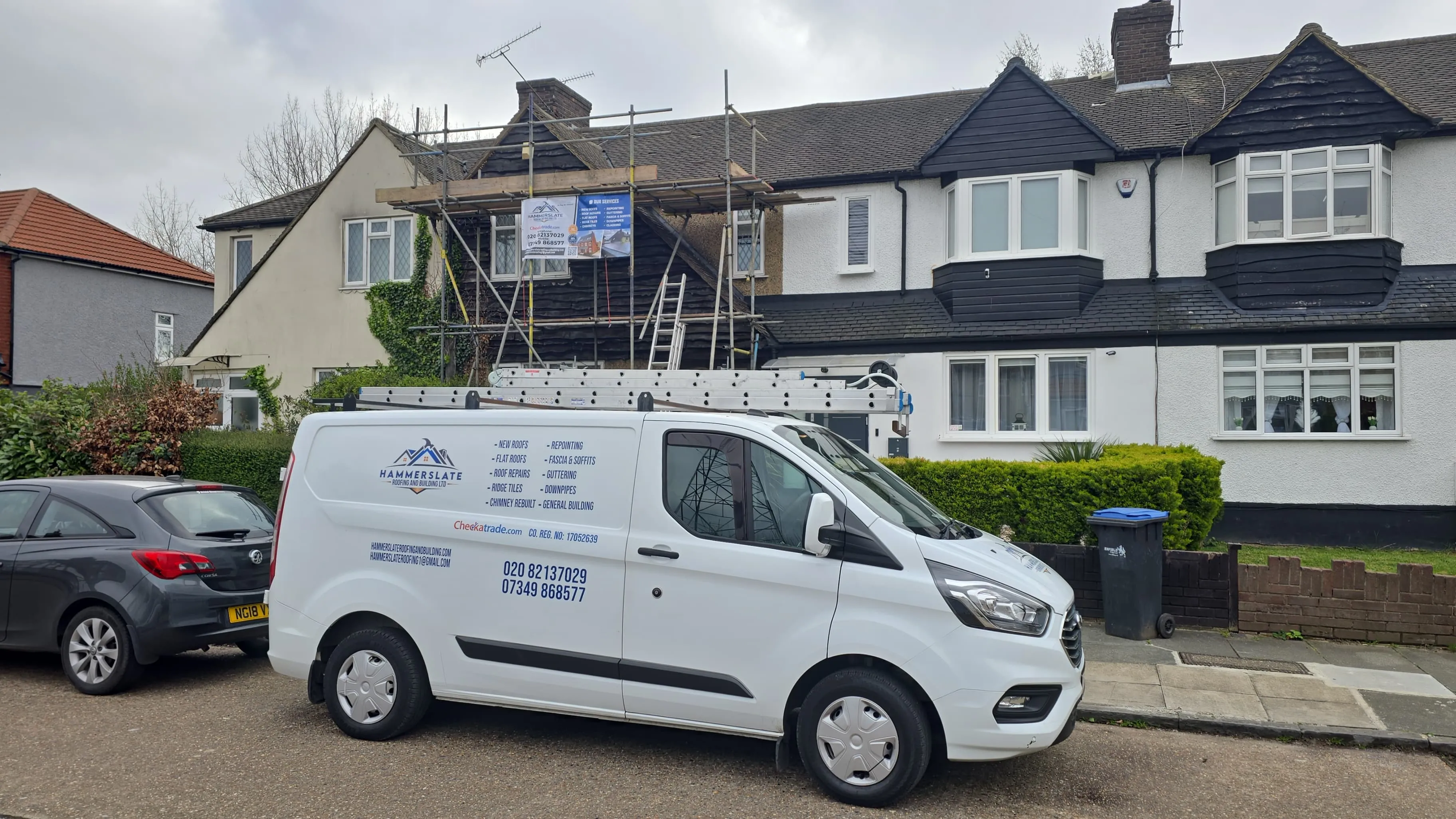 Hammerslate Roofing branded van on location in North London